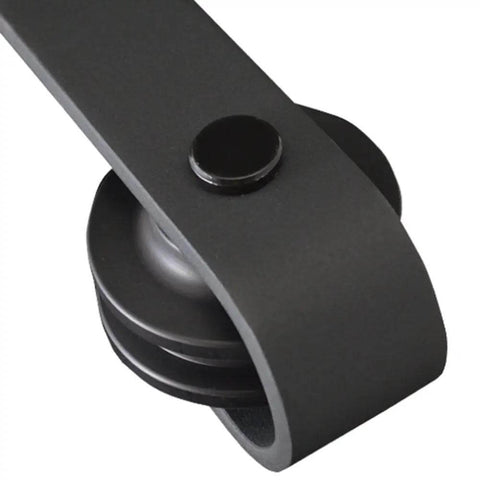 Close-up of the matte black track hardware from Barn Door Kit With Hardware For 84 By 84 Inch MDF Door, 4 Lite Frosted Glass, Frosted Collection.