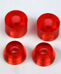 Four Pack Skateboard Pivot Cups Replacement Kit With PU Shock Absorber Pads For Longboard Trucks in Transparent Red 95A, top view.