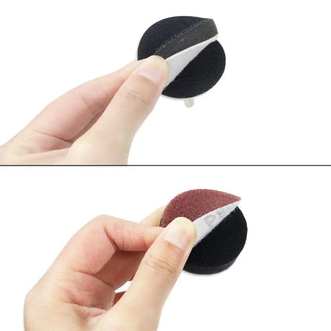 Hands holding 2 Inch Drill Sander Attachment With Backer Plate And One Quarter Inch Shank 100 Piece Sanding Discs Pad Kit for surfaces.