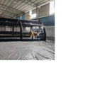 Indoor view of 20x16ft Commercial PVC Inflatable Batting Cage For Baseball Practice With Net, showcasing durable black design