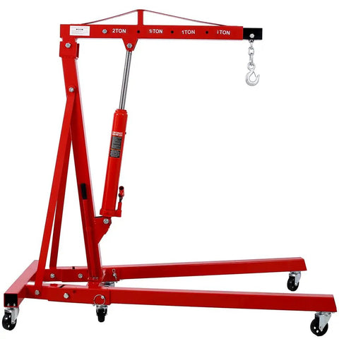 No Sweat Lifting Two Ton Folding Hydraulic Engine Hoist Cherry Picker with telescopic boom and steel base, red color.
