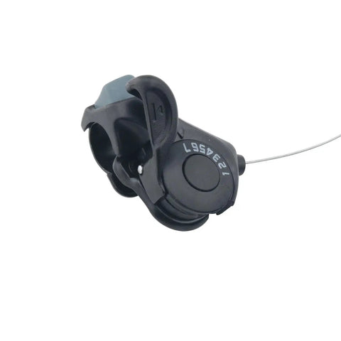 Close-up of right 3x7 TX 30 thumb shifter for mountain bikes, durable metal and plastic build, essential shifting accessory.