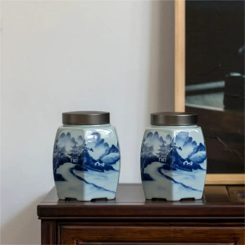 Classic Blue And White Ceramic Tea Jar Big Boy Airtight Loose Tea Storage Caddy For Kitchen Pantry Organization displayed on table.