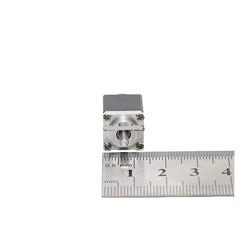 Rock Solid Badass Mini Compact Harmonic Reducer With Wicked Smooth Power Delivery And A Tight 1To50 Reduction Ratio, showing size with ruler.