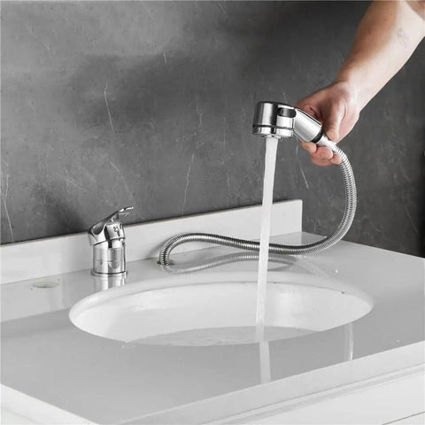 Person using Salon Shampoo Bowl Faucet Kit With Hose and Shower Spray Head for Backwash Units, chrome finish in bathroom sink.