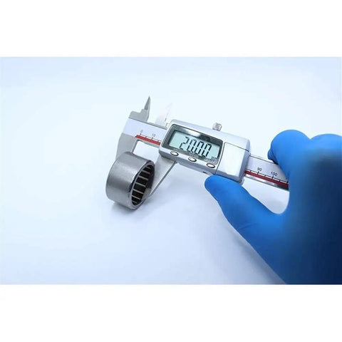 Measuring Built Tough One Way Needle Roller Bearing 30x37x20mm with calipers for precise fit evaluation.
