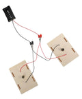 All-In-One Electrical Circuit Kit For Kids showing wires and battery holder connected to circuit boards for STEM science exploration.