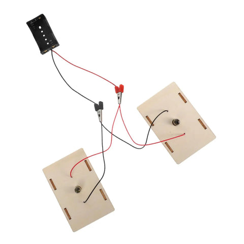 All-In-One Electrical Circuit Kit For Kids showing wires and battery holder connected to circuit boards for STEM science exploration.