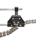 Black detacher breaker chain cutter for #25–60 roller chains with screw clamp and silver chain.