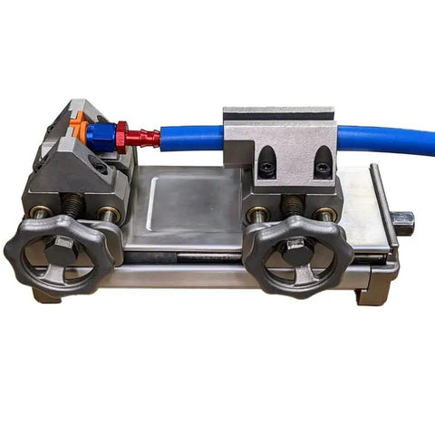 EZ On Hose Press for barbed fittings insertion, stainless steel press with blue hose, vise mount, and drive screw system visible