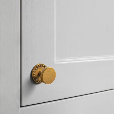 Six Pack Antique Brass Cabinet Knobs With Backplates In Zinc Alloy, Weathered Round Flowcrest Style on cabinet door