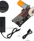 Stainless Steel Electric Belt Sander Grinder Machine With Adjustable Work Table Shockproof Feet For Abrasive Polishing Knife Making DIY Projects Versatile Desktop Polishing Tool showing motor, sanding belt, and power unit.