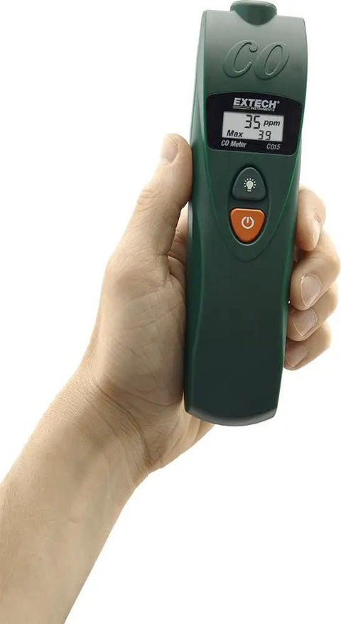 Person holding a Super Handy Portable Carbon Monoxide Detector Meter For Spot On Co Detection From Zero To One Thousand Ppm With Peak Hold Adjustable Alarm Backlit Display Battery Powered Indoor Air Safety Monitor, showing 35 ppm reading.