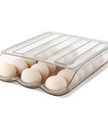 Auto Rolling Egg Holder For Fridge With Lid Large Capacity Clear Plastic Egg Dispenser Tray And Bin filled with eggs