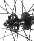 Close-up of Carbon Disc Wheelset 50C-25 Clincher Road Wheels UD Matte Finish Six Bolt hub detail.