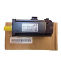 Servo motor CHUNYE MS1H4-40B30CB-A331Z-4Z with yellow shaft, black housing, placed on brown packaging.