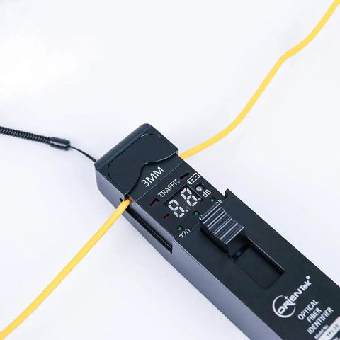 TFI-35 Pro Grade Optical Fiber Identifier With 4 Adapters for Bare Fiber Patch Cords and Ribbon Fiber in use, black.