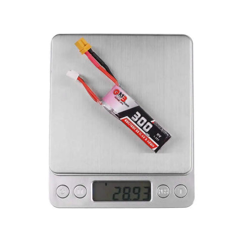 3S 11.4V 300mAh LiPo Battery With XT30 Connector For Betafpv 75X HD Toothpick FPV Racing Drones on a scale showing 28.93g