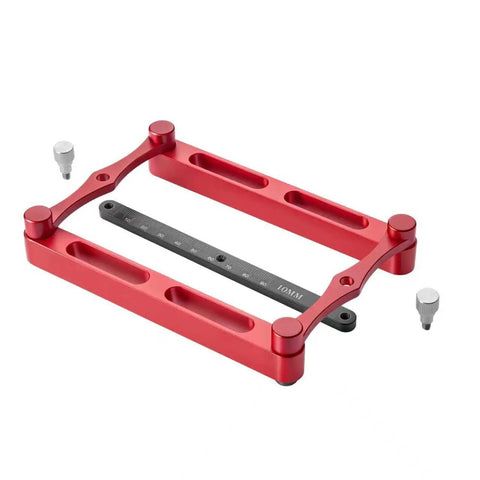 Heavy Duty Center Finder Gauge With Interchangeable Stainless Rods Rock Solid Self Centering Doweling Jig showcasing red aluminum frame and adjustable ruler.