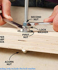 Close-up of 3/8 inch stainless lock washer installed with two nuts on a bolt through a wooden block.