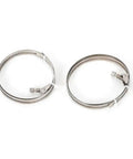 Two adjustable metal hose clamps on a white background, suitable for securing pipes and hoses in various applications.