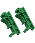 Two green C45 plastic brackets from Knockout Slick 35mm Din Rail Mount Adapter Kit for Circuit Boards.