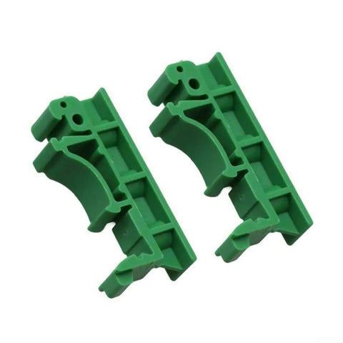 Two green C45 plastic brackets from Knockout Slick 35mm Din Rail Mount Adapter Kit for Circuit Boards.