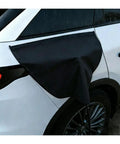 Heavy Duty Rugged EV Charger Port Cover For Subaru Trailseeker 2025 And 2026 mounted on vehicle during rain, gloss black fabric.