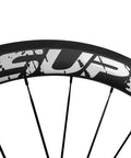 Close-up of Dual Depth 50 And 25mm UD Matte Finish 700C Carbon Wheelset Clincher showing rim detail and spokes.