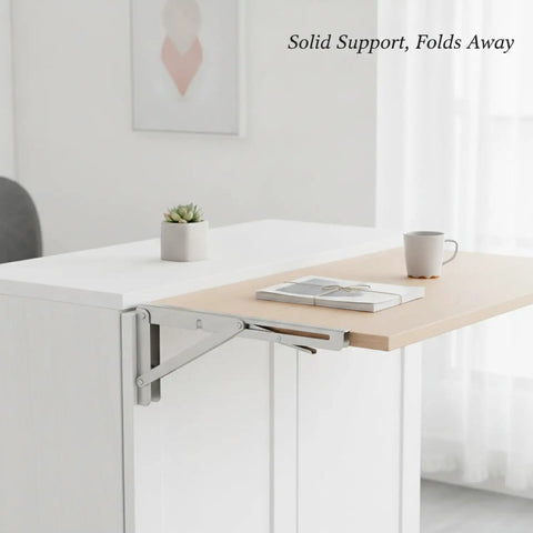 Heavy Duty Stainless Steel L Shaped Folding Shelf Bracket Wall Mount For Drop Leaf Tables And Workbenches Built Tough Space Saving Corner Support 15.4 By 5.3 Inch 1 Pack shown in use supporting a wooden drop leaf table extension.