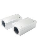 Front view of two white aluminum linear bearing slides with mounting holes.