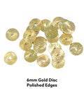 6mm Gold Disc Spacer Beads crafted from solid brass showing polished edges, perfect for DIY jewelry crafting.