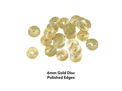 6mm Gold Disc Spacer Beads crafted from solid brass showing polished edges, perfect for DIY jewelry crafting.