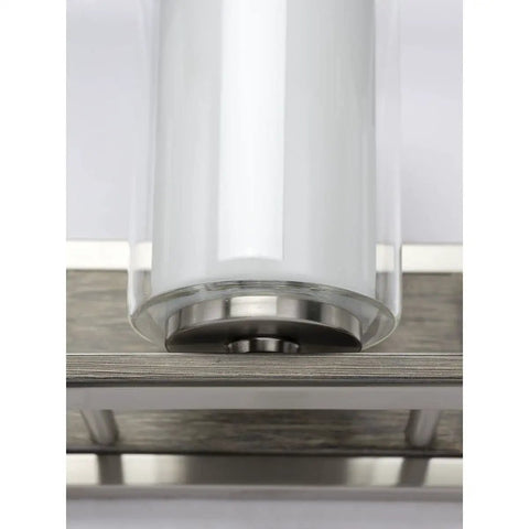 Close-up of Four Light Linear Chandelier in Brushed Nickel with Faux Wood Back Plate and Clear and Etched Glass Shades detail