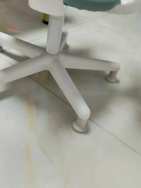 Close-up of an office chair with Bell Glides High Profile 2.5 Inch 5 Pack White for Carpet Replacement instead of wheels.