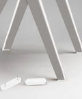 All In One Furniture Glide Nails Set With Oval Double Head Pins And Round Single Pins, displayed near table legs