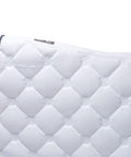 Close-up of Quilted Contoured Dressage Pad With Braided Trim For Top Notch Horse Comfort And Smooth Arena Performance