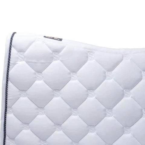 Close-up of Quilted Contoured Dressage Pad With Braided Trim For Top Notch Horse Comfort And Smooth Arena Performance
