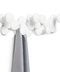 Slick Scandinavian Wall Mounted Coat Hooks Knockout Resin Organizer featuring a sleek white design with a gray scarf hanging.