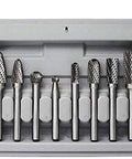Front view of eight carbide burrs with 1/4 in shanks in a gray plastic case; double-cut bits for die grinder.