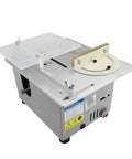 Super Compact Mini Table Saw For Woodworking With Integrated Drill Press And Lathe Base Tough As Nails 12 To 24 Volt Power Tool side view with clear plastic guard.