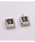 Two ultra tiny 18mm 020 bare square DC motors with narrow shafts for DIY robotics and RC projects, shown side by side.