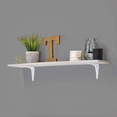 White Powder Coated Shelf Brackets Set 10 Inch By 12 Inch Four Pack Heavy Duty Wall Mount Brackets With 150 Lbs Weight Capacity Pre Drilled Holes For Easy Mounting Durable Support For Home Shelves holding a decorated shelf