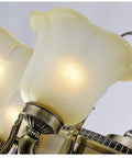 Close-up of glass shades on Solid Build Ceiling Fan With 8 Head Glass Lamps And Remote Control Hella Quiet Motor.