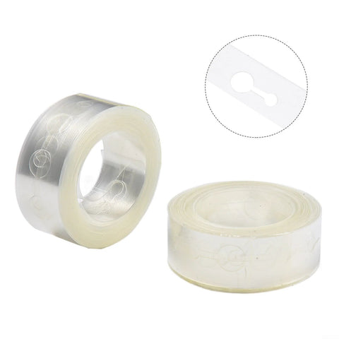 Two transparent plastic balloon arch strip rolls for DIY garland, shown.