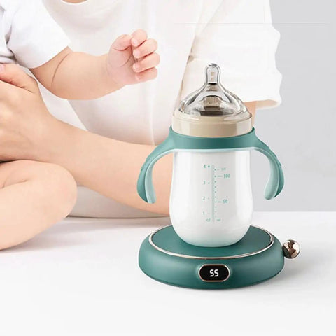 Electric Coffee Mug Warmer For Desk Keep Those Sips Straight Up Piping Hot With This Zero Fuss Plate Heater For Coffee Tea Cocoa Milk And Soup In Bold Red Or Green, with baby bottle on heater.