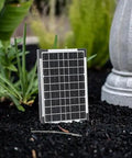 Solar panel of Tall White 44 Inch Fiberglass Resin Solar Water Fountain With Panel And Auto Shut Off Pump for garden decor.