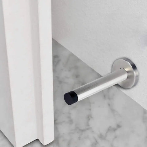 Long 8 Inch Stainless Steel Door Stopper Heavy Duty Brushed Finish With Rubber Absorber Anti Collision Wall Protector, installed view.