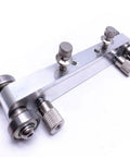 Adjustable Guitar Nut And Bridge Sander Luthier Tool for electric, acoustic, and bass guitars with aluminum body and steel rollers.