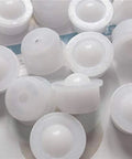 Close-up of 20 Piece Nylon Ball Transfer Bearing Set for Mini Table Conveyors one third inch omni directional roller bearings